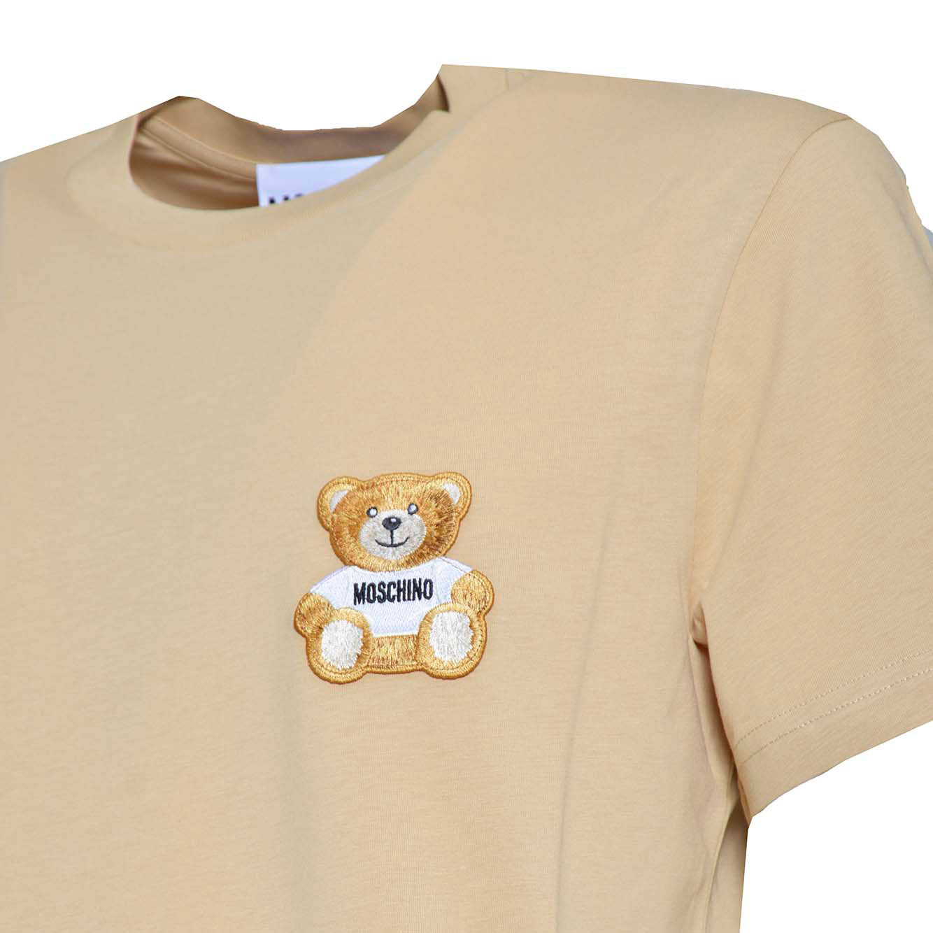 T-shirt in cotone organico beige con patch Teddy Moschino