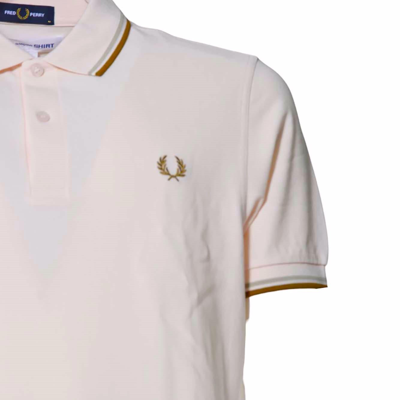 Polo in maglia di cotone pesca con righe Fred Perry x Comme des Garçons Shirt 